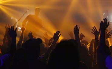 Congregation worshipping during Sunday service at Fellowship Baptist Church